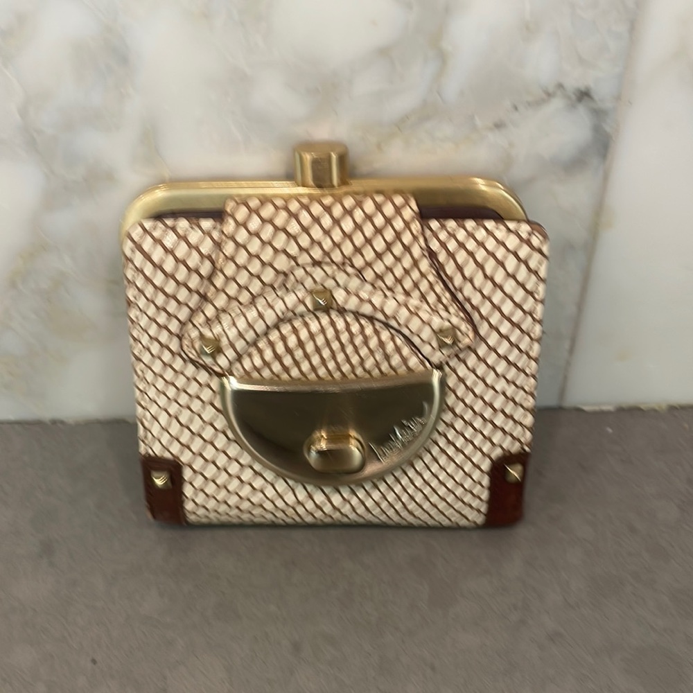 Botkier brown and white snakes skinned wallet. Excellent cond.
